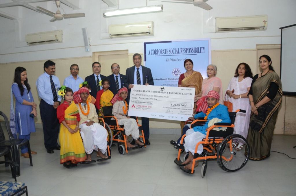 Image 1 - Presentation to cheque to Indian Institute of Cerebral Palsy