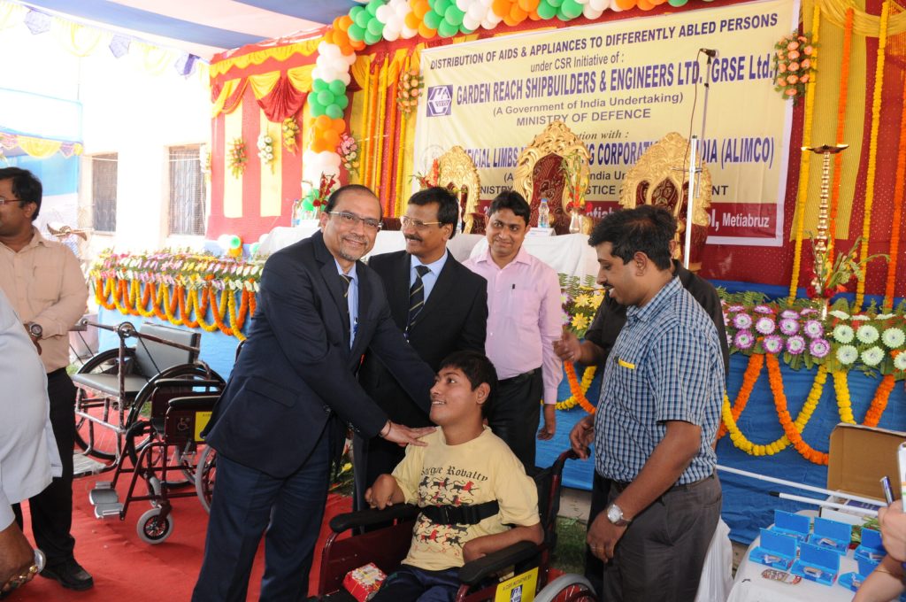Distribution of aids and appliances to differently abled persons in association with Artificial Limb Manufacturing Corporation of India (ALIMCO) GRSE has signed a MOU with ALIMCO for distributing assistive aids to approx 1000 differently abled persons from marginalized section of society - Image 1 Image 1 - Distribution of aids and appliances to differently abled persons in association with Artificial Limb Manufacturing Corporation of India (ALIMCO) GRSE has signed a MOU with ALIMCO for distributing assistive aids to approx 1000 differently abled persons from marginalized section of society